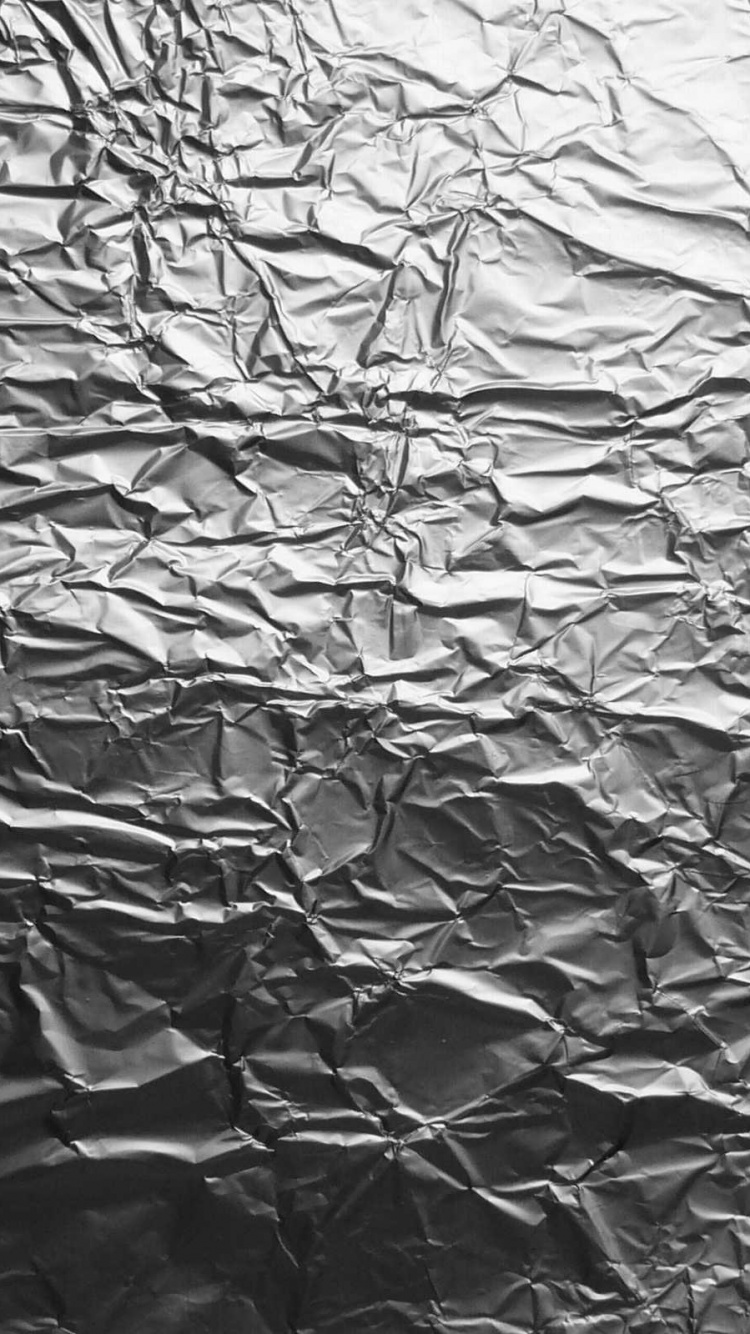 Обои металл, текстура, фольга, ветвь, вода в разрешении 750x1334