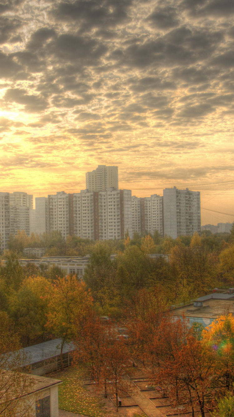 Обои небоскреб, город, городской район, городской пейзаж, дневное время в разрешении 750x1334