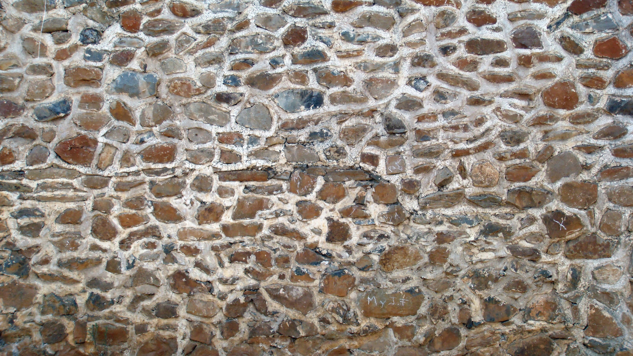 Обои каменная стена, стена, рок, узор, геология в разрешении 2560x1440