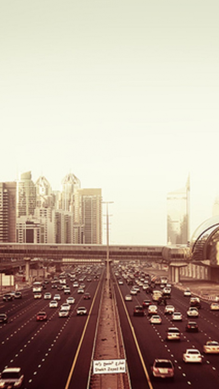 Обои объектив камеры, камера, небоскреб, метрополия, городской район в разрешении 720x1280