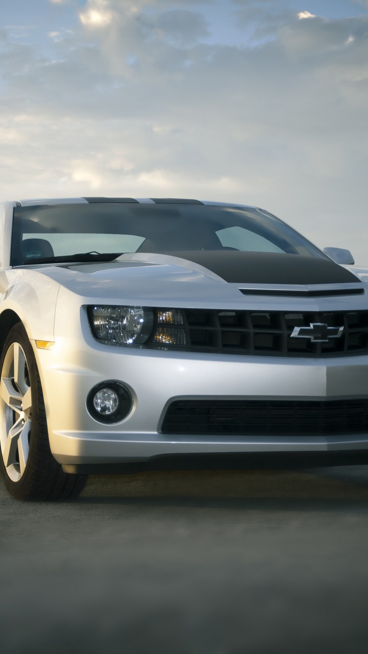 Обои Форд Мустанг, бампер, Шевроле камаро, Дженерал Моторз, автомобиль в разрешении 720x1280