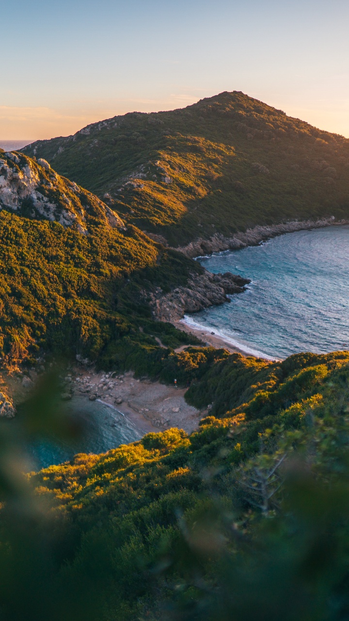 Обои Двойные бухты Порто Тимони, ютуб, вода, гора, природный ландшафт в разрешении 720x1280