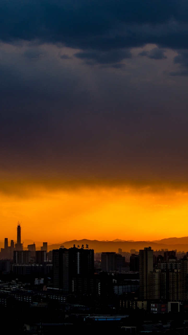 Обои облако, ночь, закат, послесвечение, городской район в разрешении 720x1280