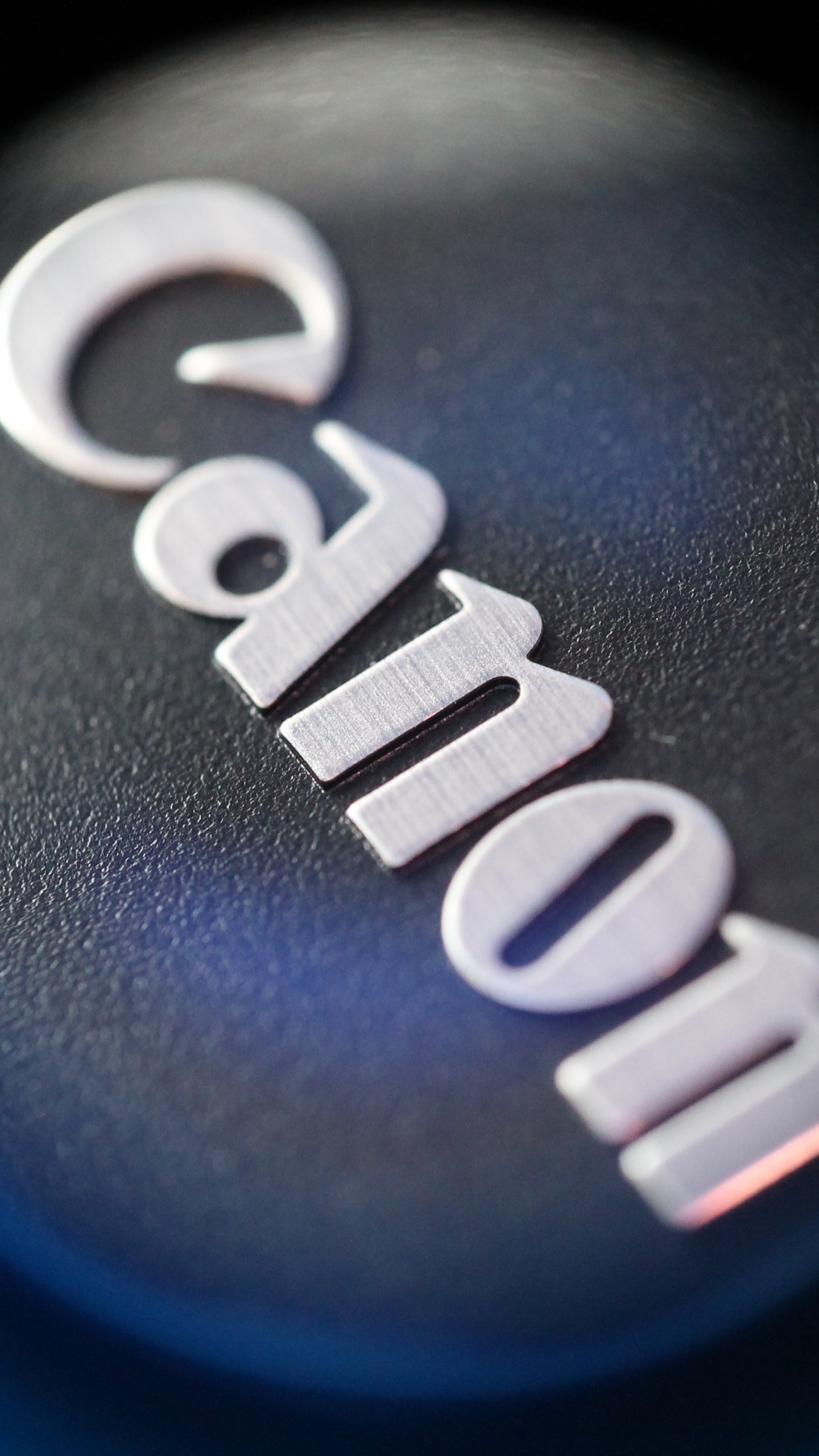 Обои крупный план, марка, лого, графика, дизайн в разрешении 1440x2560