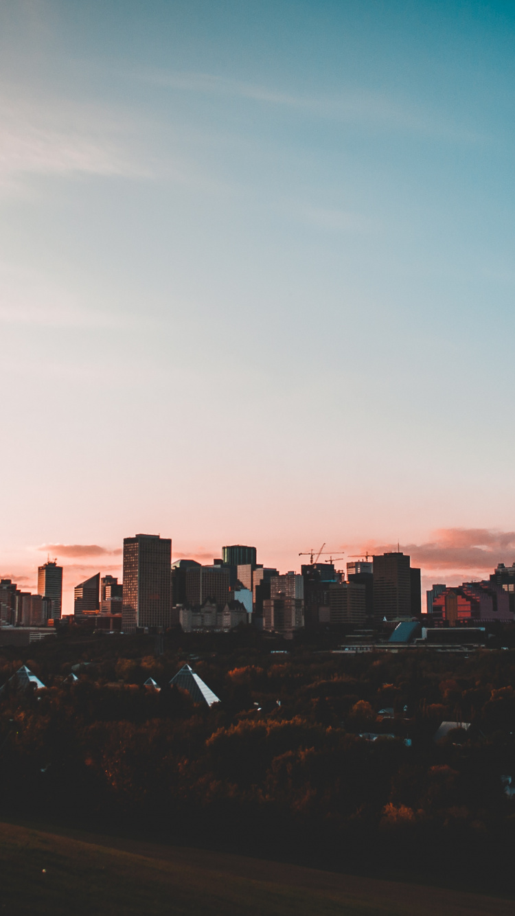 Обои закат, город, архитектура, облако, горизонт в разрешении 750x1334