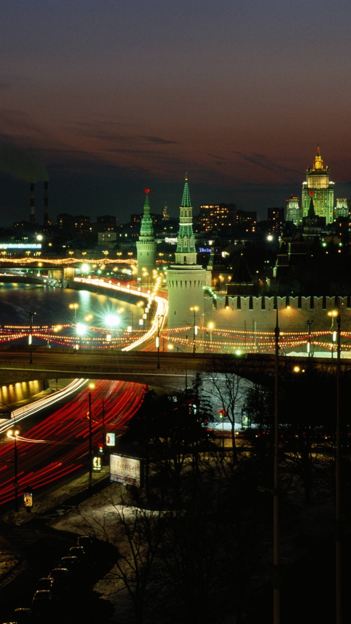 Обои ночь, городской пейзаж, город, городской район, метрополия в разрешении 720x1280