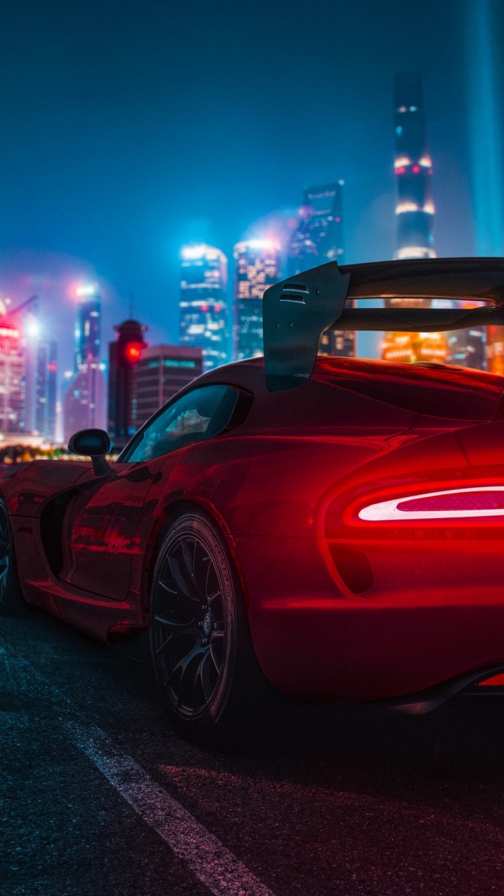 Обои спорткар, колесо, шина, легковые автомобили, автомобильное освещение в разрешении 720x1280