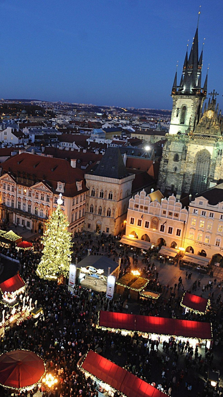 Обои Прага, Рождественский день, Рождественский рынок, ориентир, город в разрешении 750x1334