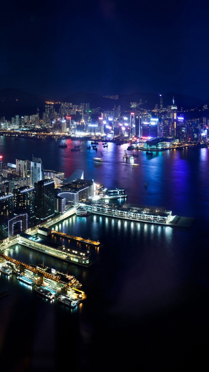 Обои ночь, небоскреб, городской пейзаж, город, городской район в разрешении 720x1280