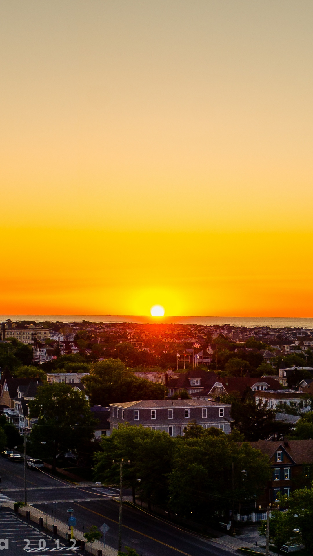 Обои закат, горизонт, городской пейзаж, городской район, город в разрешении 1080x1920