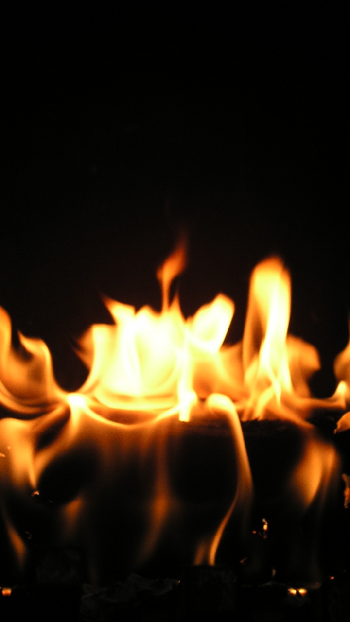 Обои пламя, свеча, огонь, тепло, освещение в разрешении 720x1280