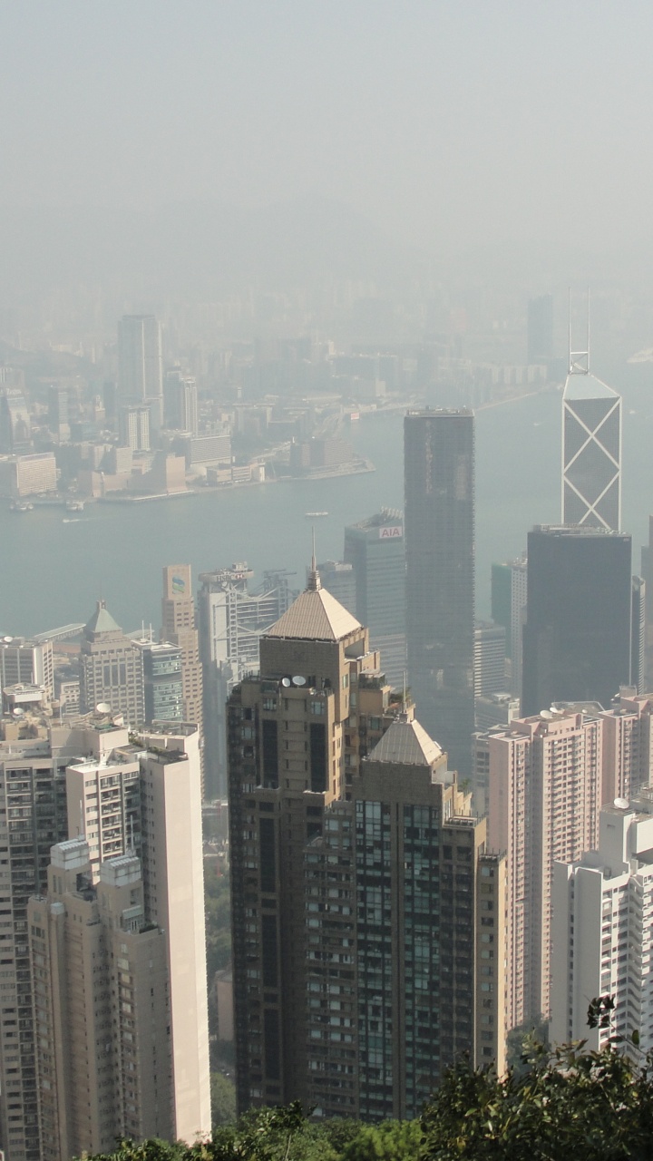 Обои городской пейзаж, небоскреб, метрополия, городской район, город в разрешении 720x1280