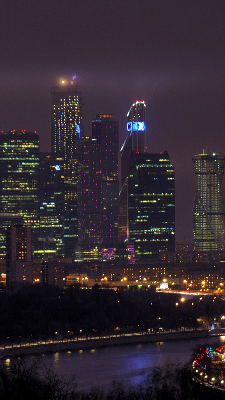 Обои небоскреб, ночь, городской пейзаж, город, метрополия в разрешении 750x1334