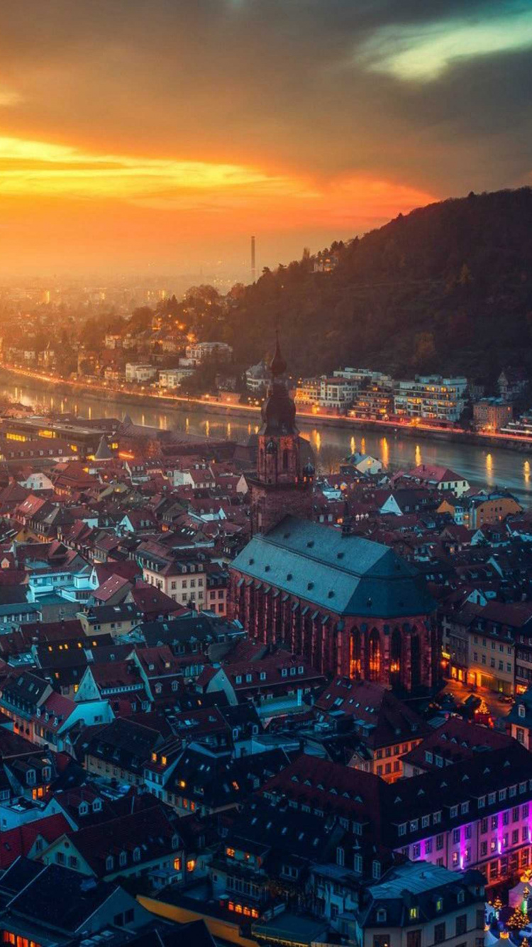 Обои городской пейзаж, городской район, город, метрополия, вечер в разрешении 750x1334