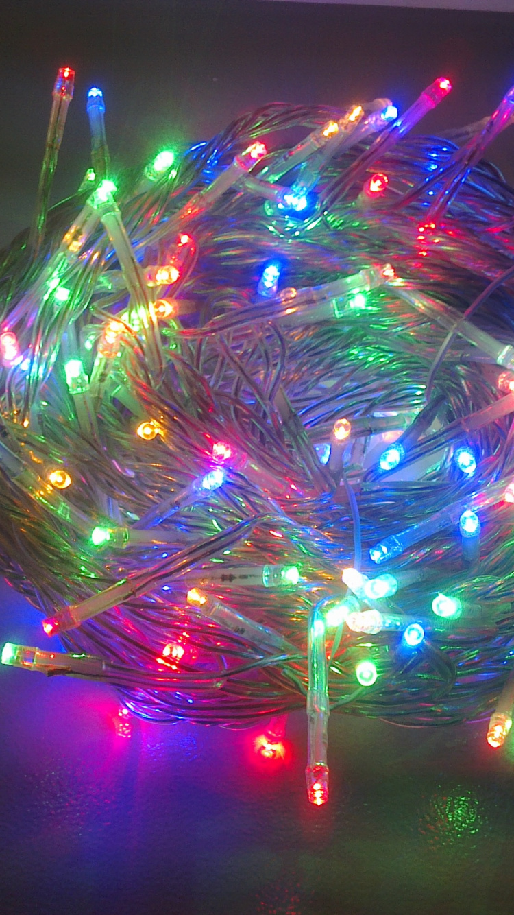 Обои гирлянда, светодиодные лампы, свет, освещение, Рождественские украшения в разрешении 750x1334