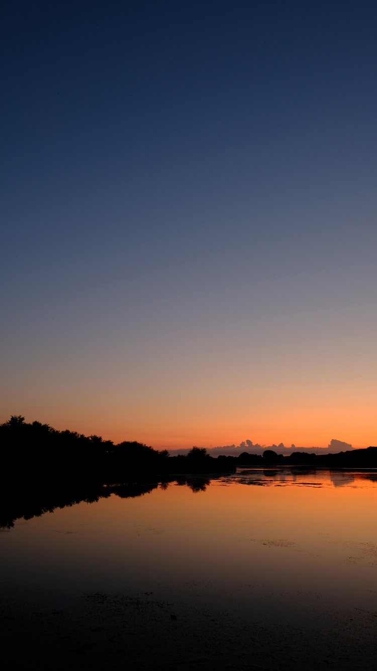 Обои закат, горизонт, отражение, природа, вода в разрешении 750x1334