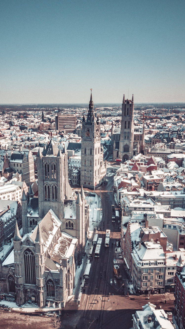 Обои городской район, здание, дневное время, небоскреб, городской дизайн в разрешении 750x1334