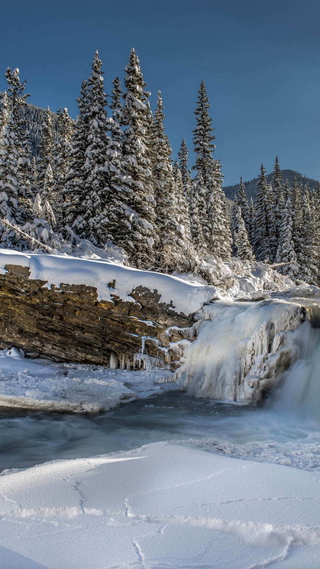 Обои снег, зима, водопад, вода, гора в разрешении 1080x1920