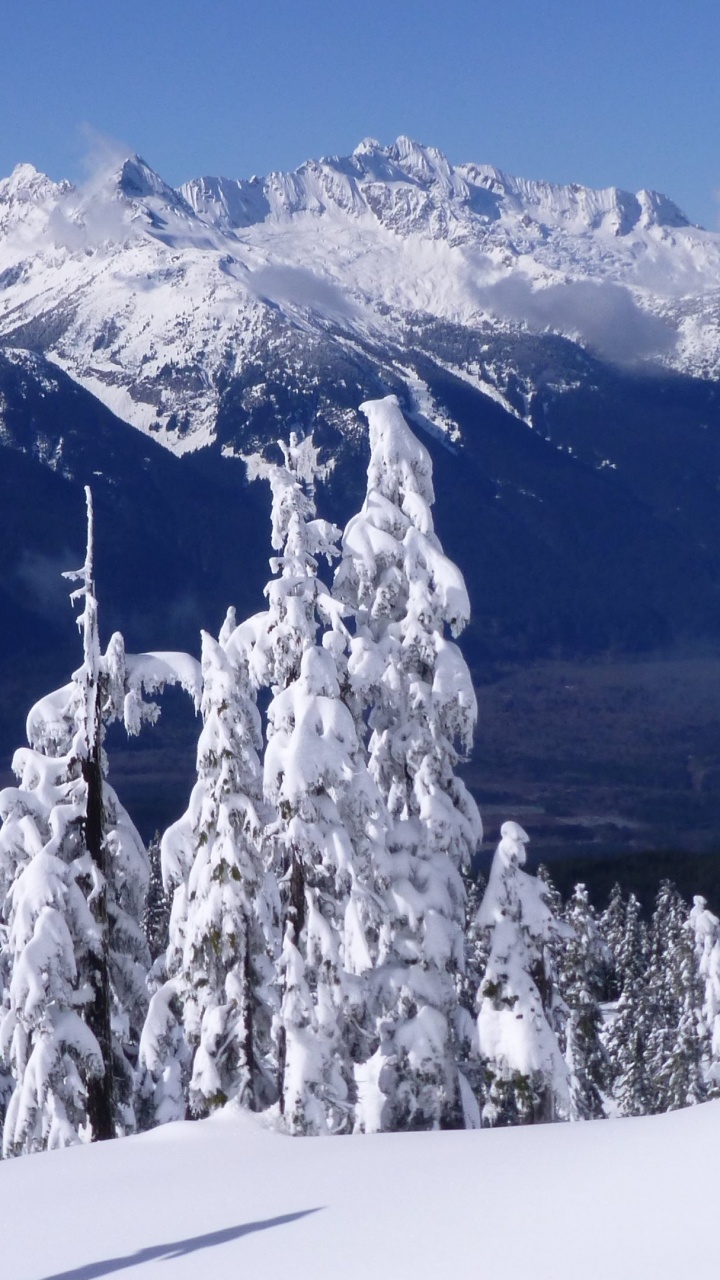 Обои снег, горный рельеф, гора, горный хребет, зима в разрешении 720x1280