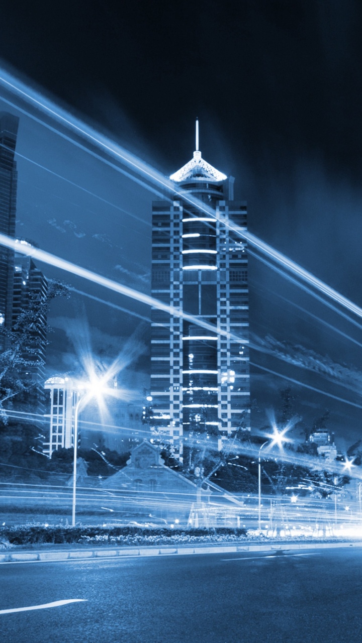 Обои небоскреб, ночь, метрополия, город, городской район в разрешении 720x1280