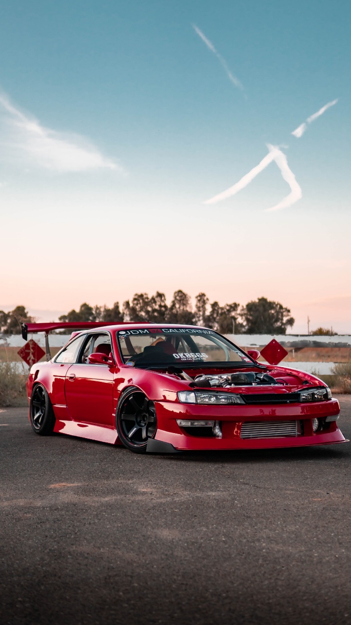 Обои спорткар, красный цвет, дрифтинг, время атаки, Король в разрешении 720x1280