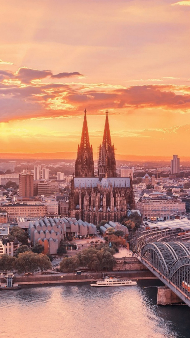 Обои город, городской пейзаж, ориентир, закат, линия горизонта в разрешении 750x1334