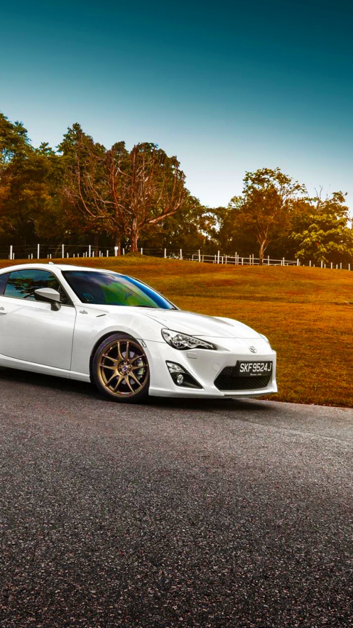 Обои спорткар, toyota, белый, вид сбоку, Тойота hilux в разрешении 720x1280