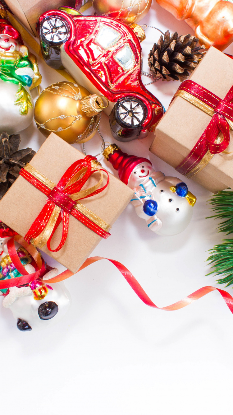 Обои Новый год, подарок, рождественский орнамент, Рождественские украшения, Рождество в разрешении 750x1334