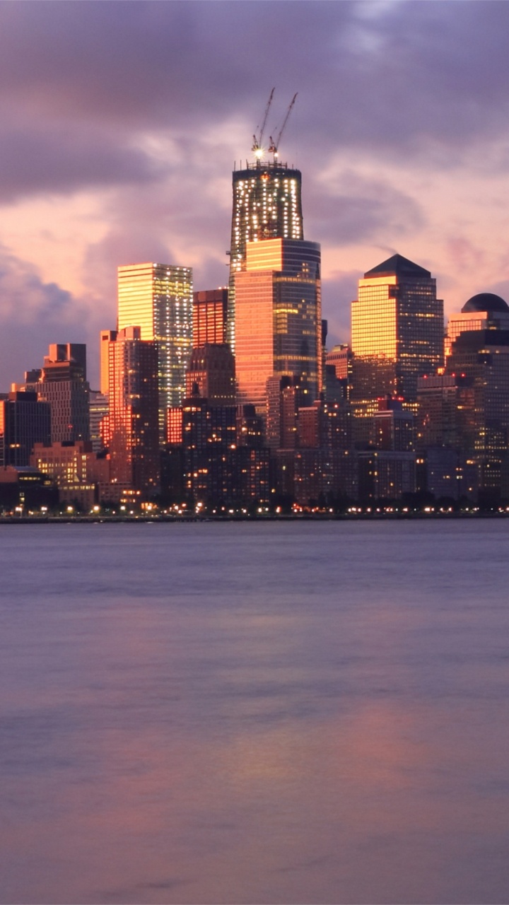 Обои линия горизонта, небоскреб, город, городской пейзаж, городской район в разрешении 720x1280