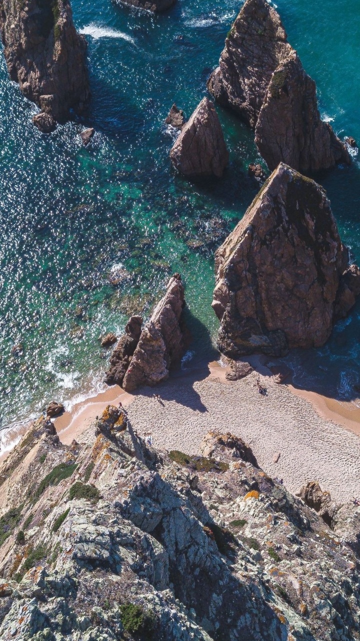 Обои море, рок, берег, побережье, вода в разрешении 720x1280