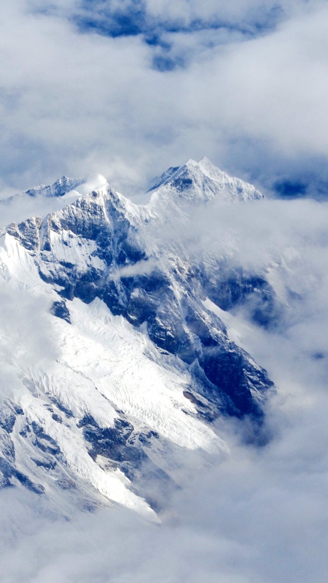 Обои горный хребет, горный рельеф, облако, снег, нунатак в разрешении 1080x1920