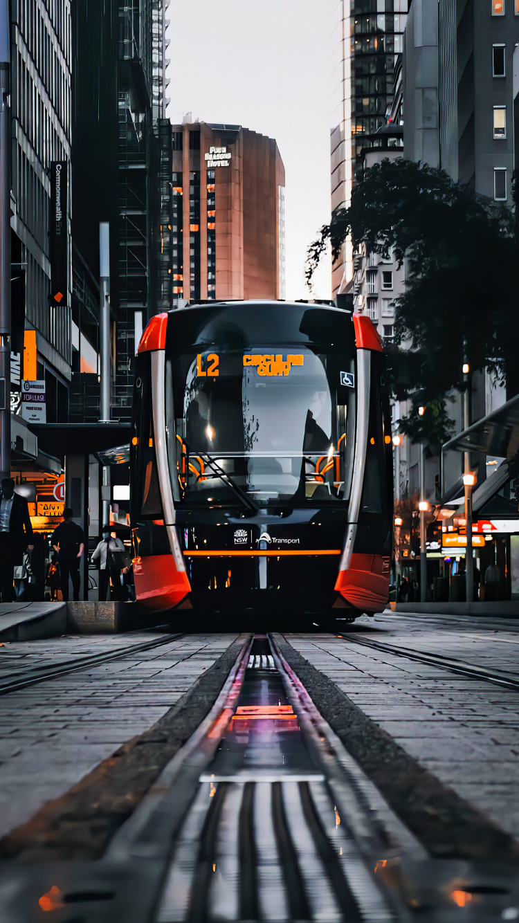 Обои трамвай, общественный транспорт, транспорт, здание, автомобильное освещение в разрешении 750x1334