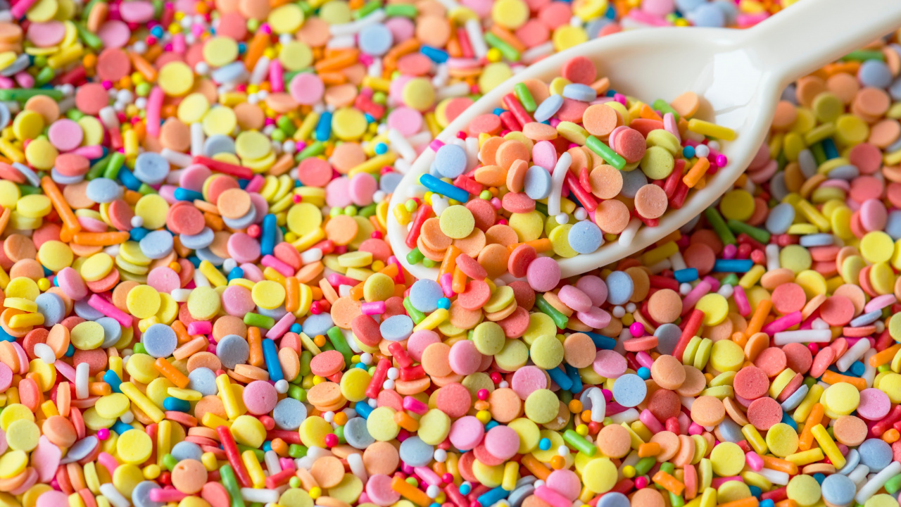 Обои красочные конфеты, леденец, конфета, брызгает, кондитерские изделия в разрешении 1280x720