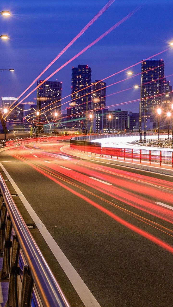 Обои дорога, ночь, городской район, магистраль, мост в разрешении 720x1280