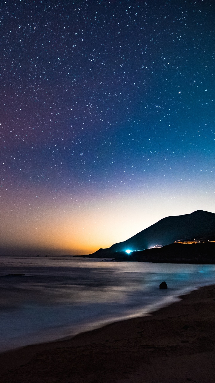 Обои берег, ночь, ночное небо, море, горизонт в разрешении 720x1280