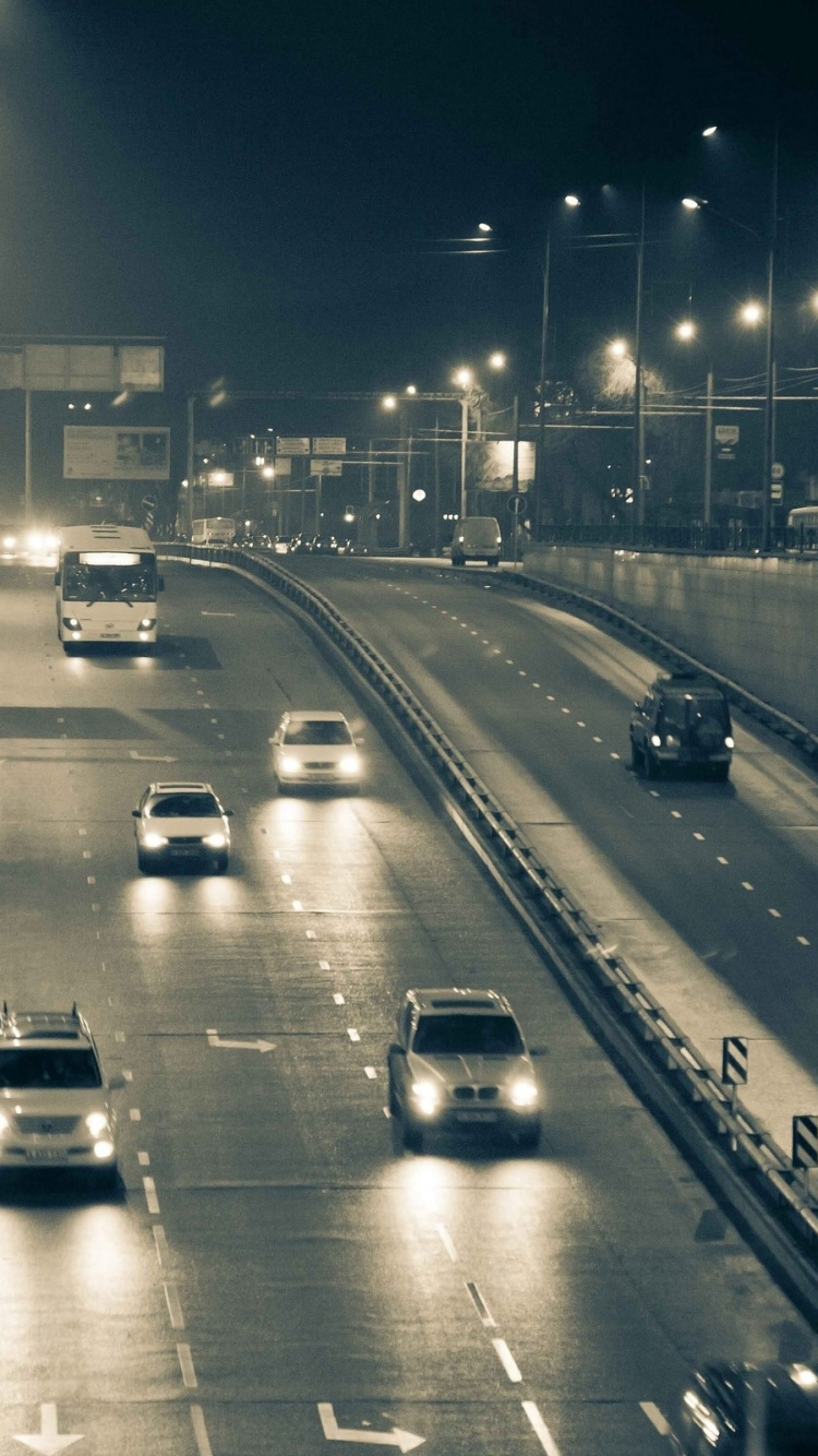 Обои дорога, переулок, ночь, магистраль, городской район в разрешении 750x1334