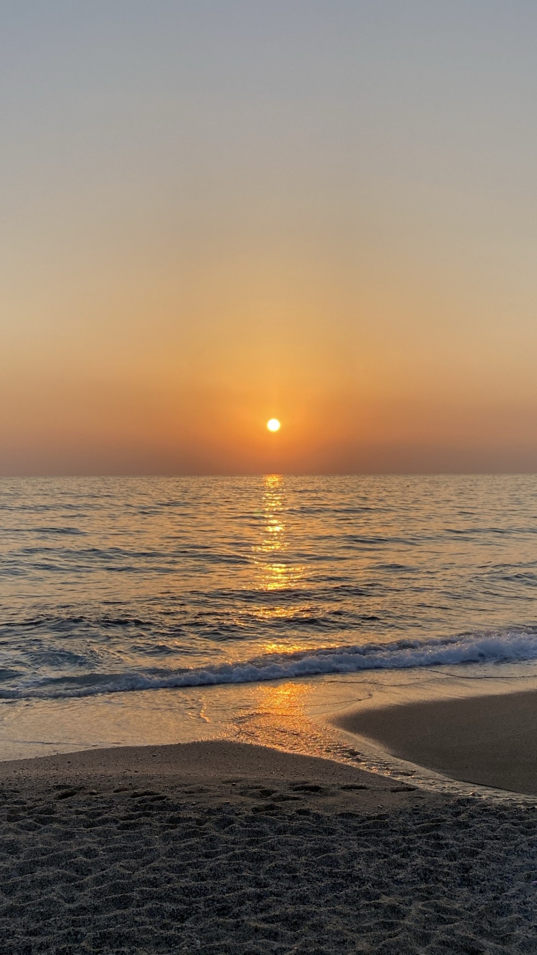 Обои закат, вода, жидкость, послесвечение, солнечный свет в разрешении 1080x1920