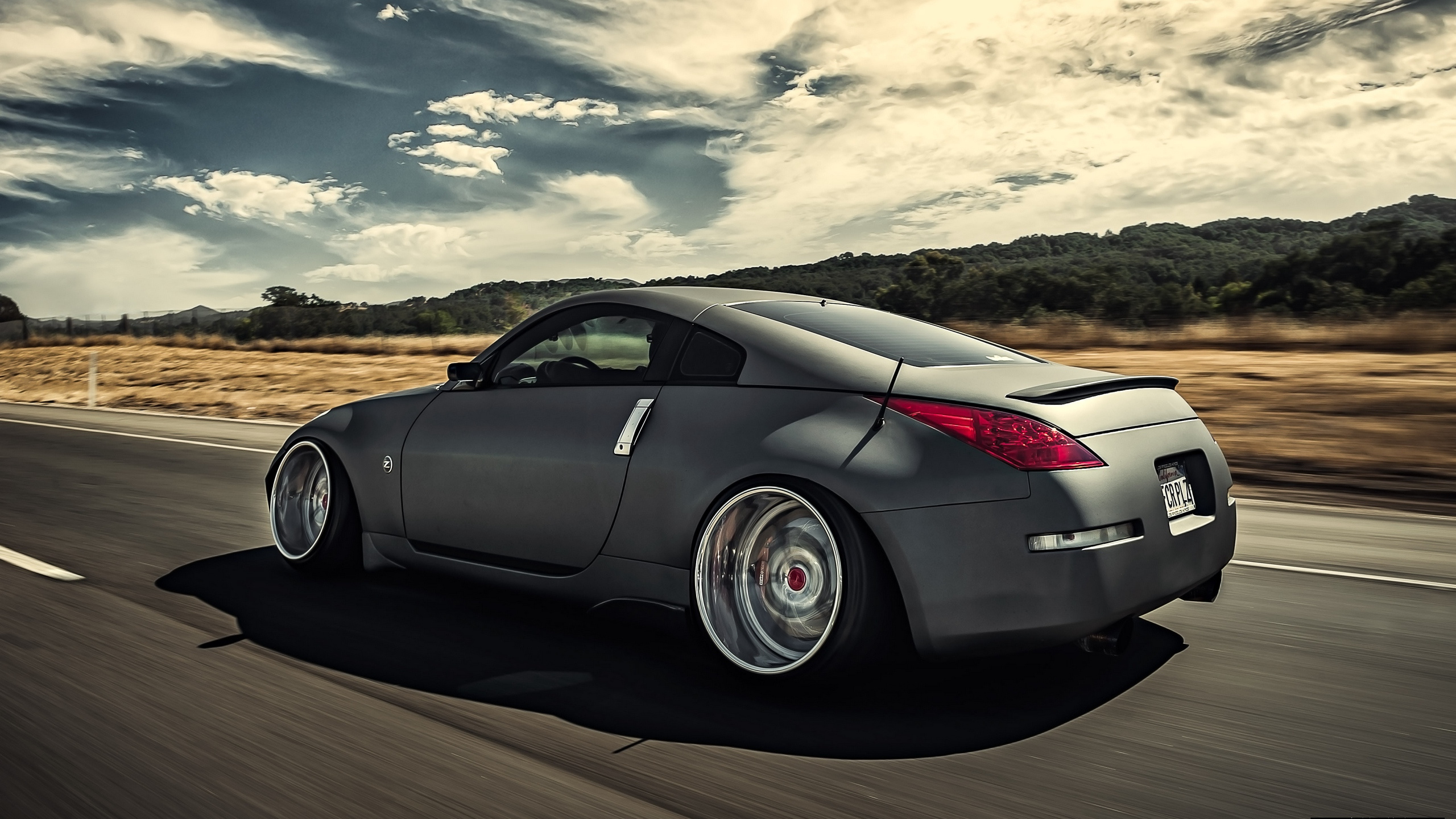 Обои nissan 350z, Ниссан, авто, спорткар, колесо в разрешении 2560x1440