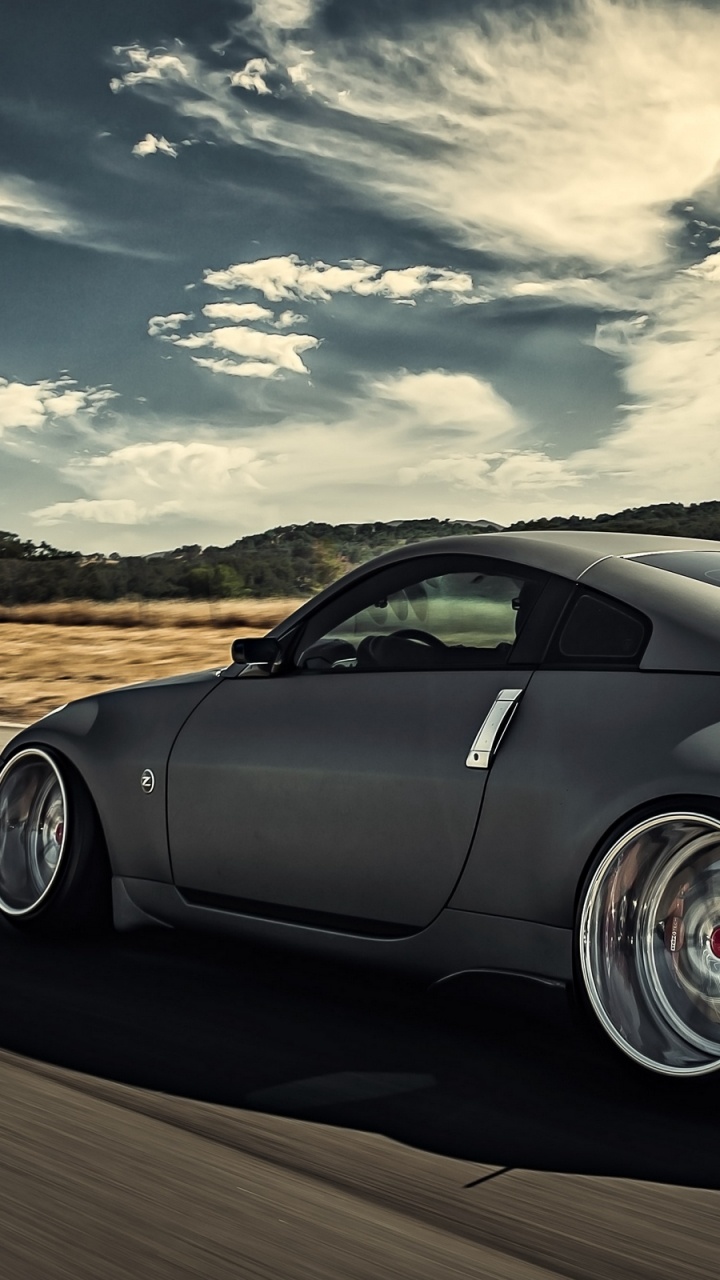 Обои nissan 350z, Ниссан, авто, спорткар, колесо в разрешении 720x1280