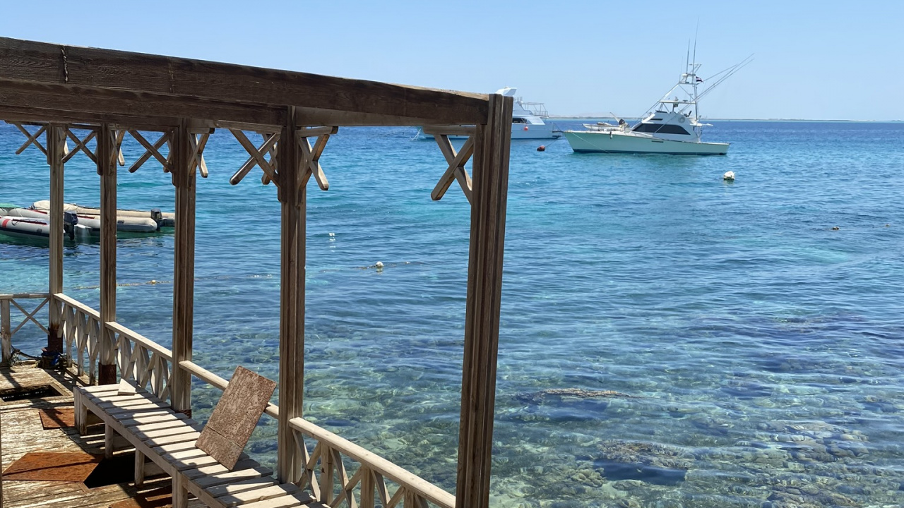 Обои море, лодка, вода, горизонт, океан в разрешении 1280x720