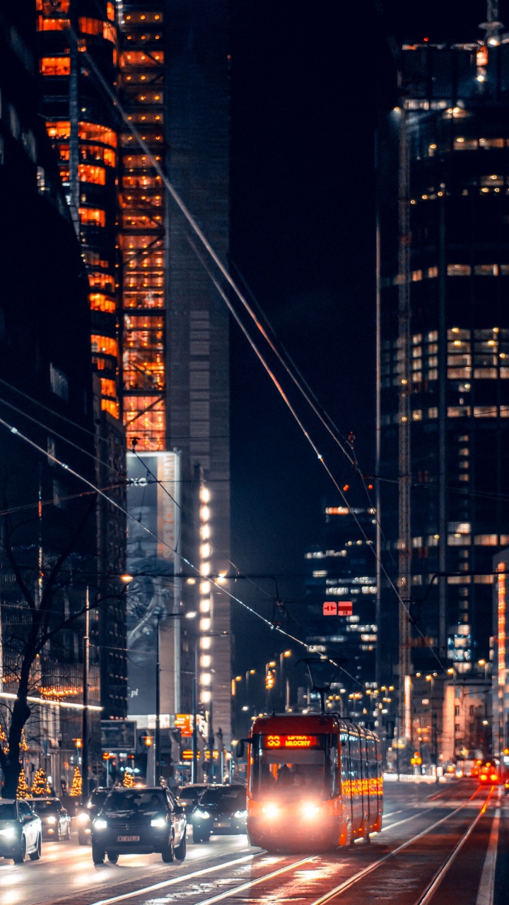 Обои Варшава, здание, небоскреб, автомобильное освещение, свет в разрешении 720x1280