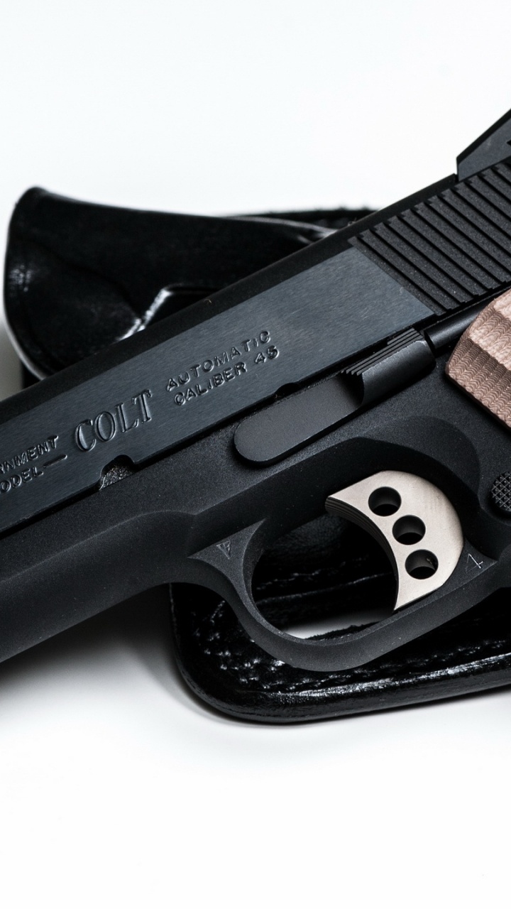 Обои пистолет м1911, орудие, огнестрельное оружие, триггер, пневматическое оружие в разрешении 720x1280