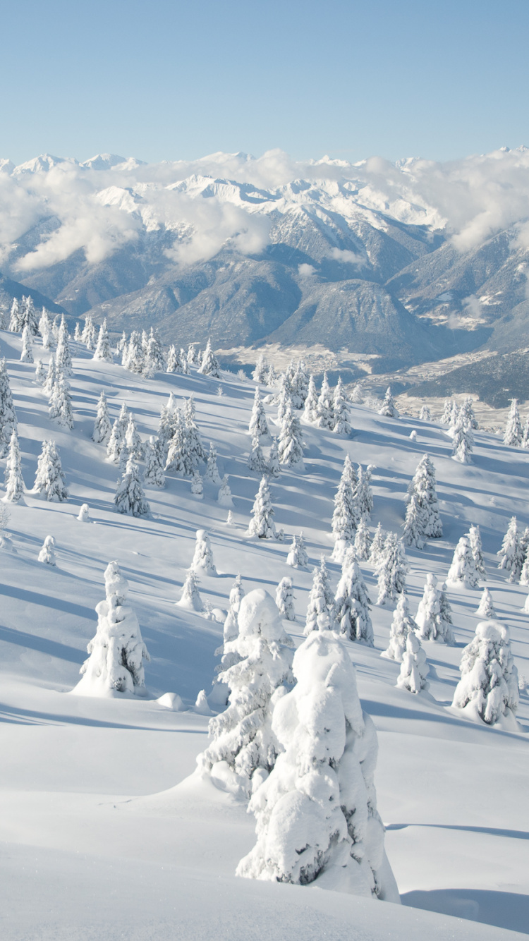 Обои гора, снег, зима, горный хребет, горный рельеф в разрешении 750x1334