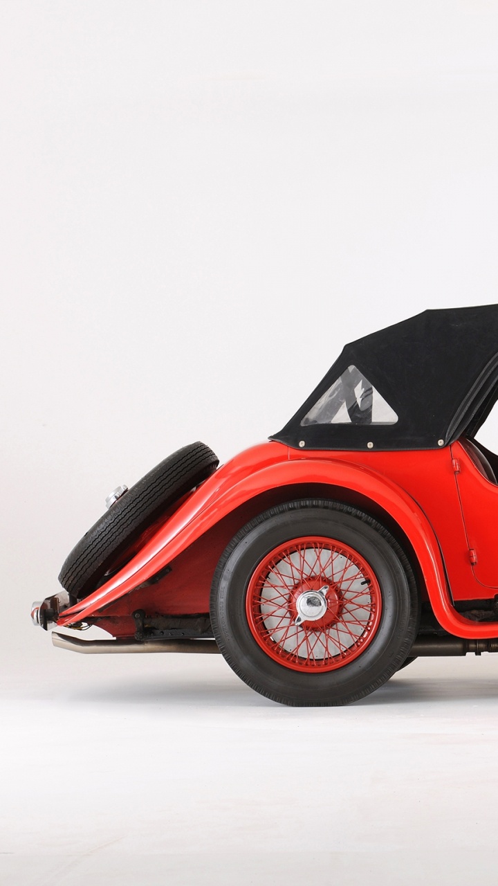 Обои Астон Мартин, спорткар, классический автомобиль, старинный автомобиль, aston martin vanquish в разрешении 720x1280