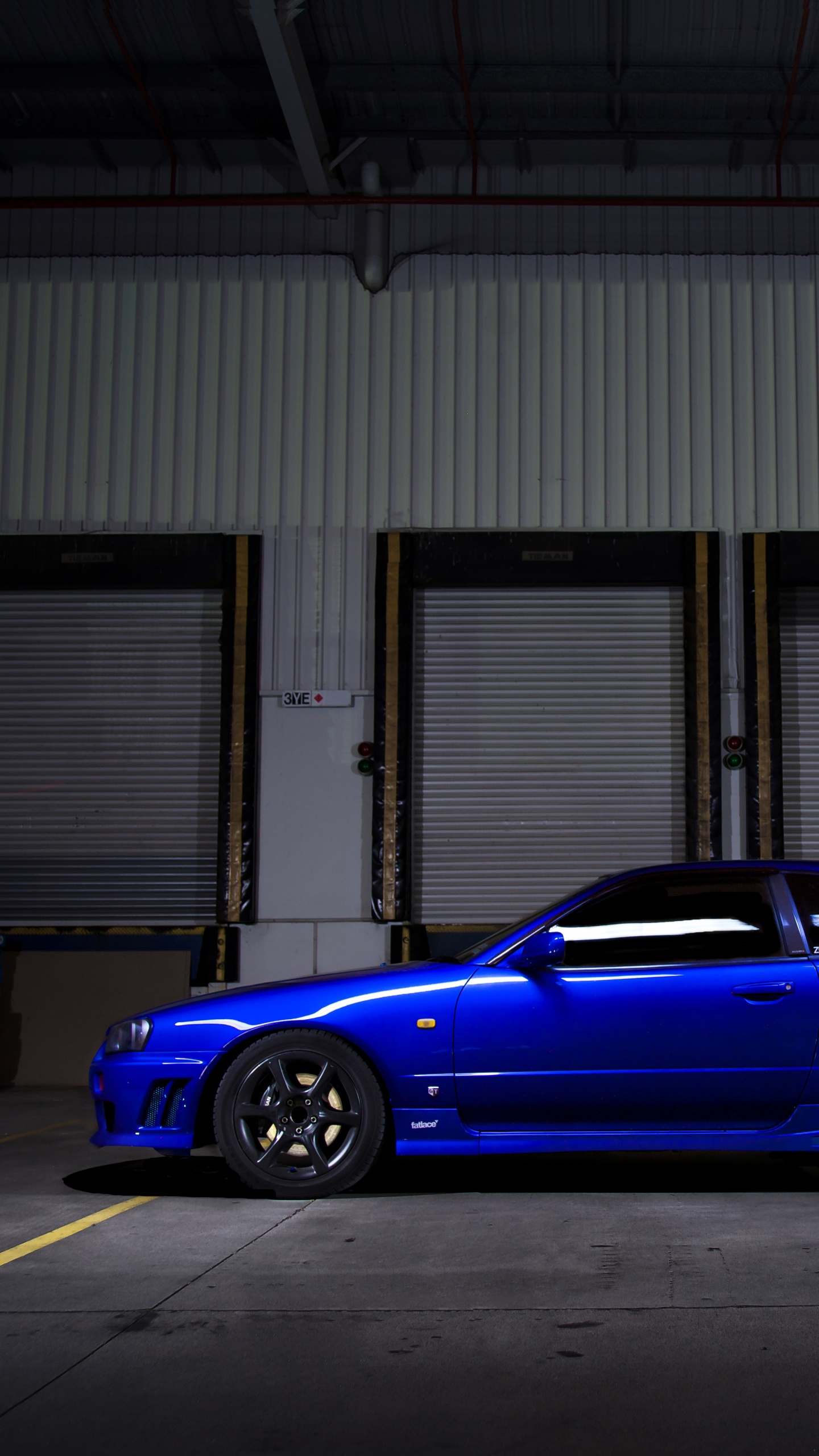 Обои nissan skyline, спорткар, Ниссан, колесо, авто в разрешении 1440x2560