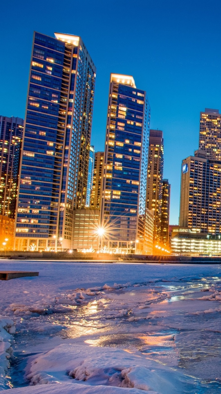 Обои зима, город, городской пейзаж, линия горизонта, небоскреб в разрешении 720x1280