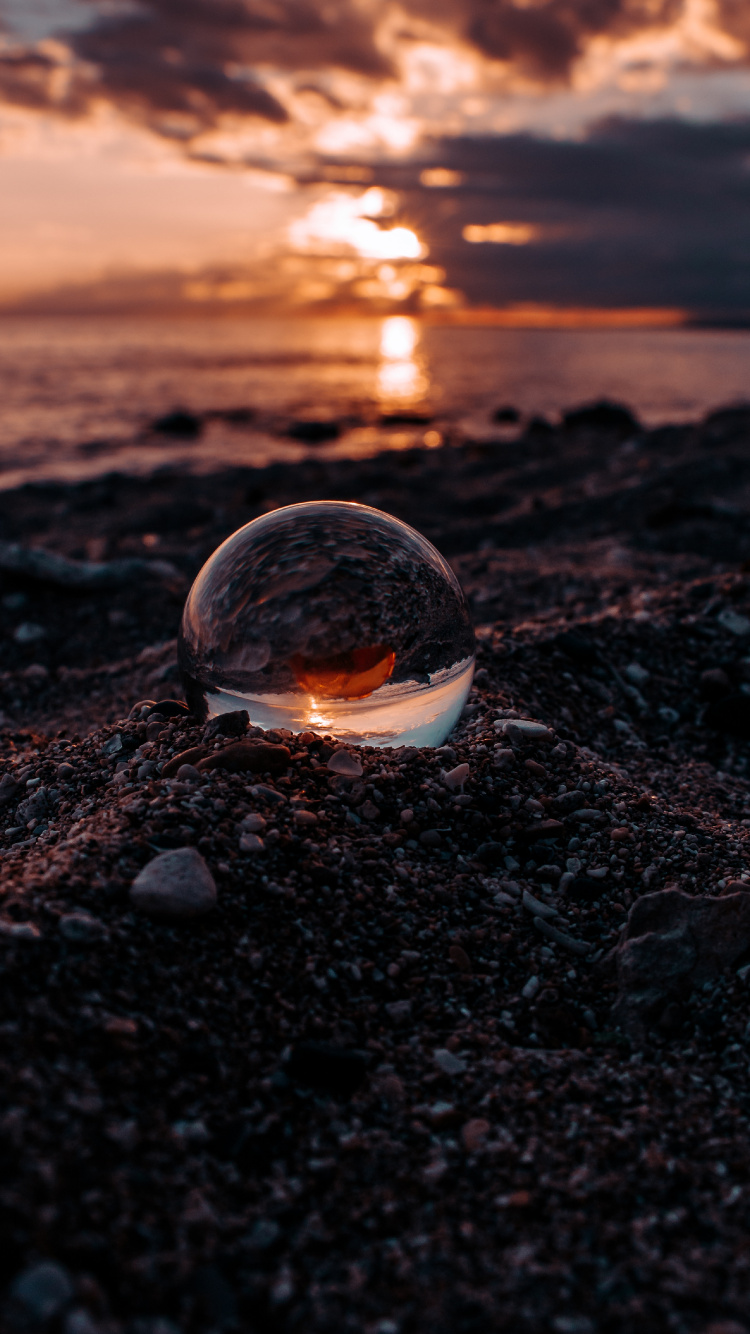 Обои вода, отражение, рок, небо, огонь в разрешении 750x1334