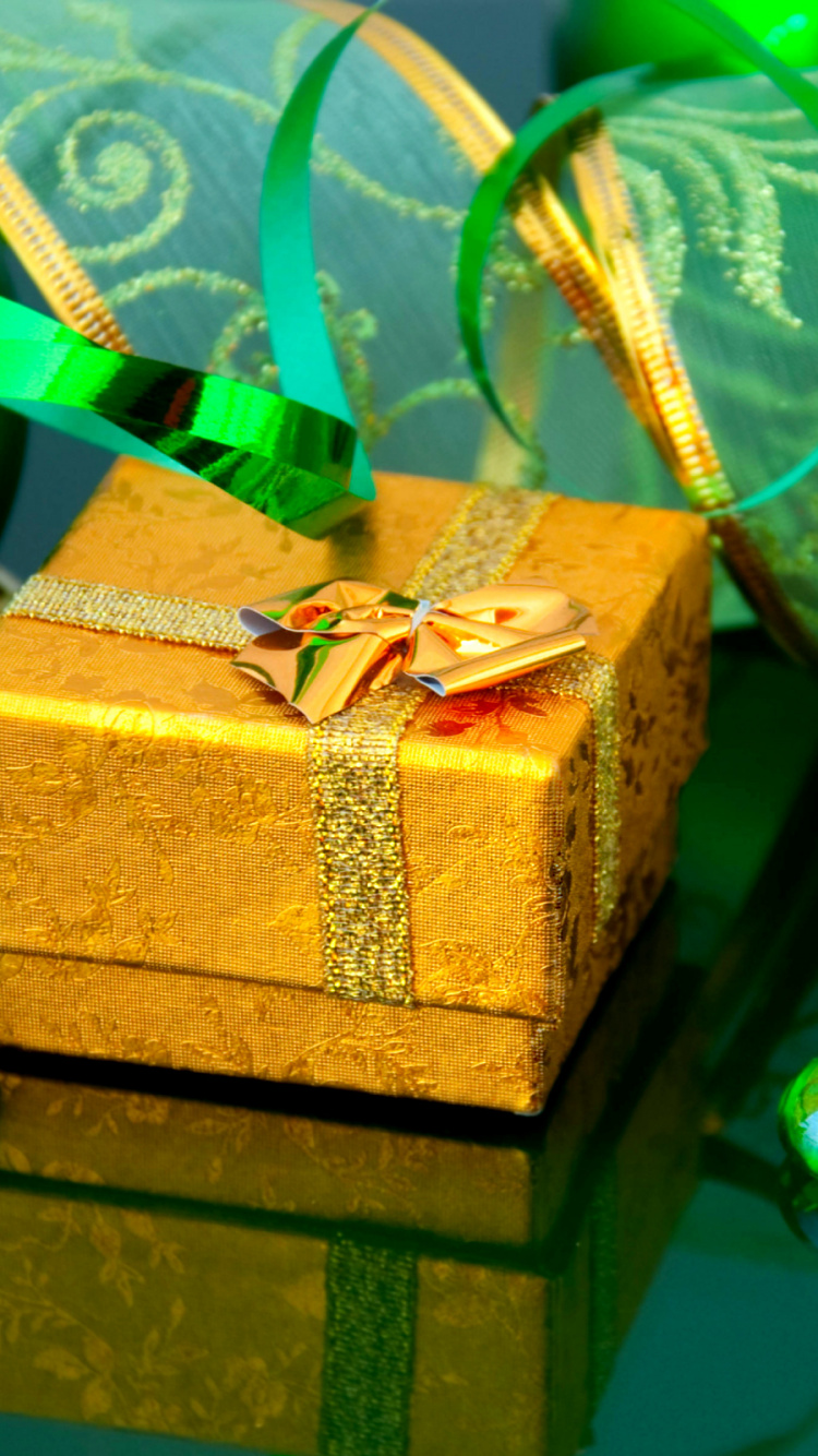 Обои Рождественский день, зеленый, подарок, Рождество в разрешении 750x1334