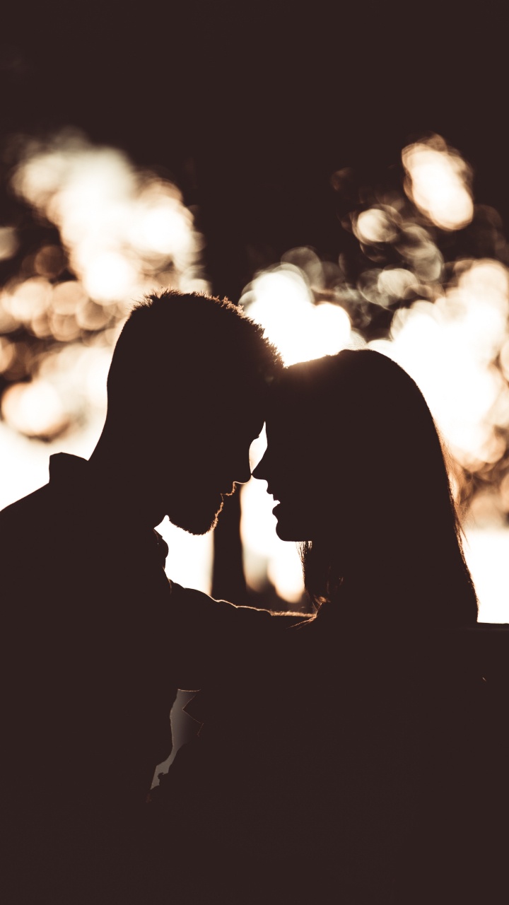 Обои роман, пара, поцелуй, силуэт, любовь в разрешении 720x1280