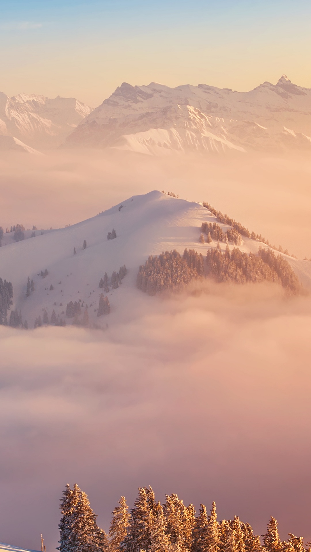 Обои гора, море облаков, горный хребет, горный рельеф, зима в разрешении 1080x1920